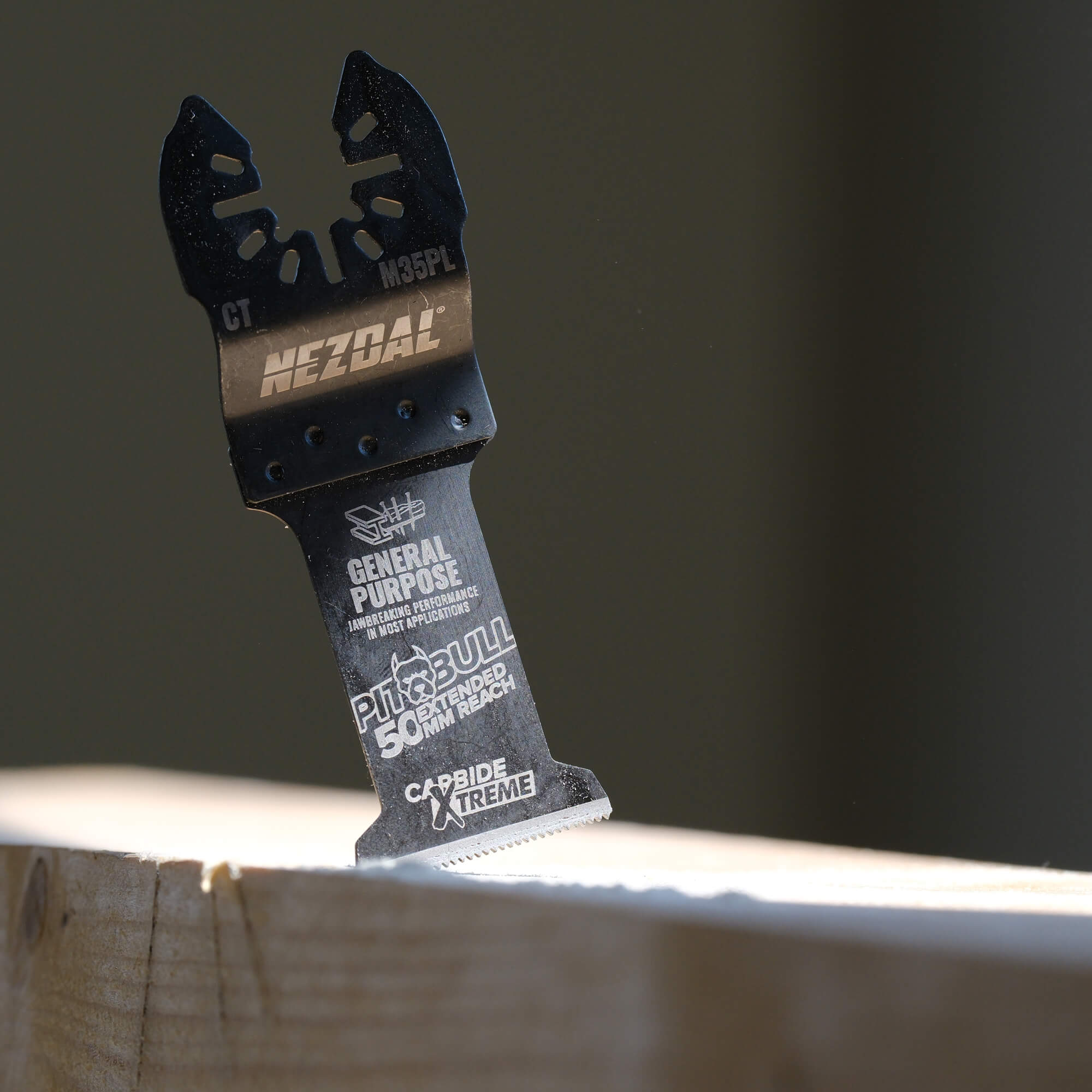 pitbull multi-tool blade cutting in wood