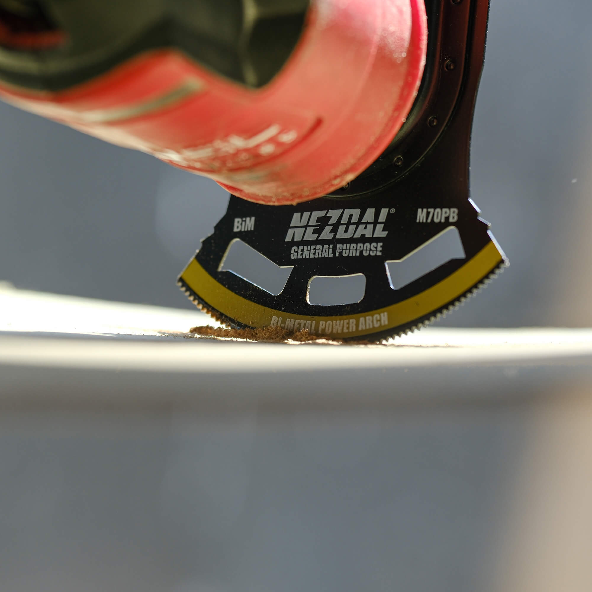 Wide segmented multi-tool blade cutting wood