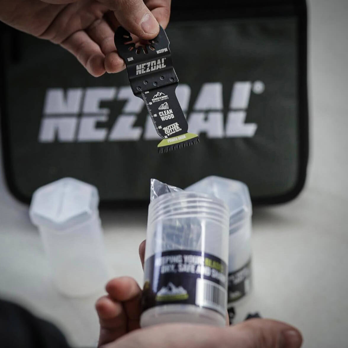 picture of a nezdal saw blade going into storage box